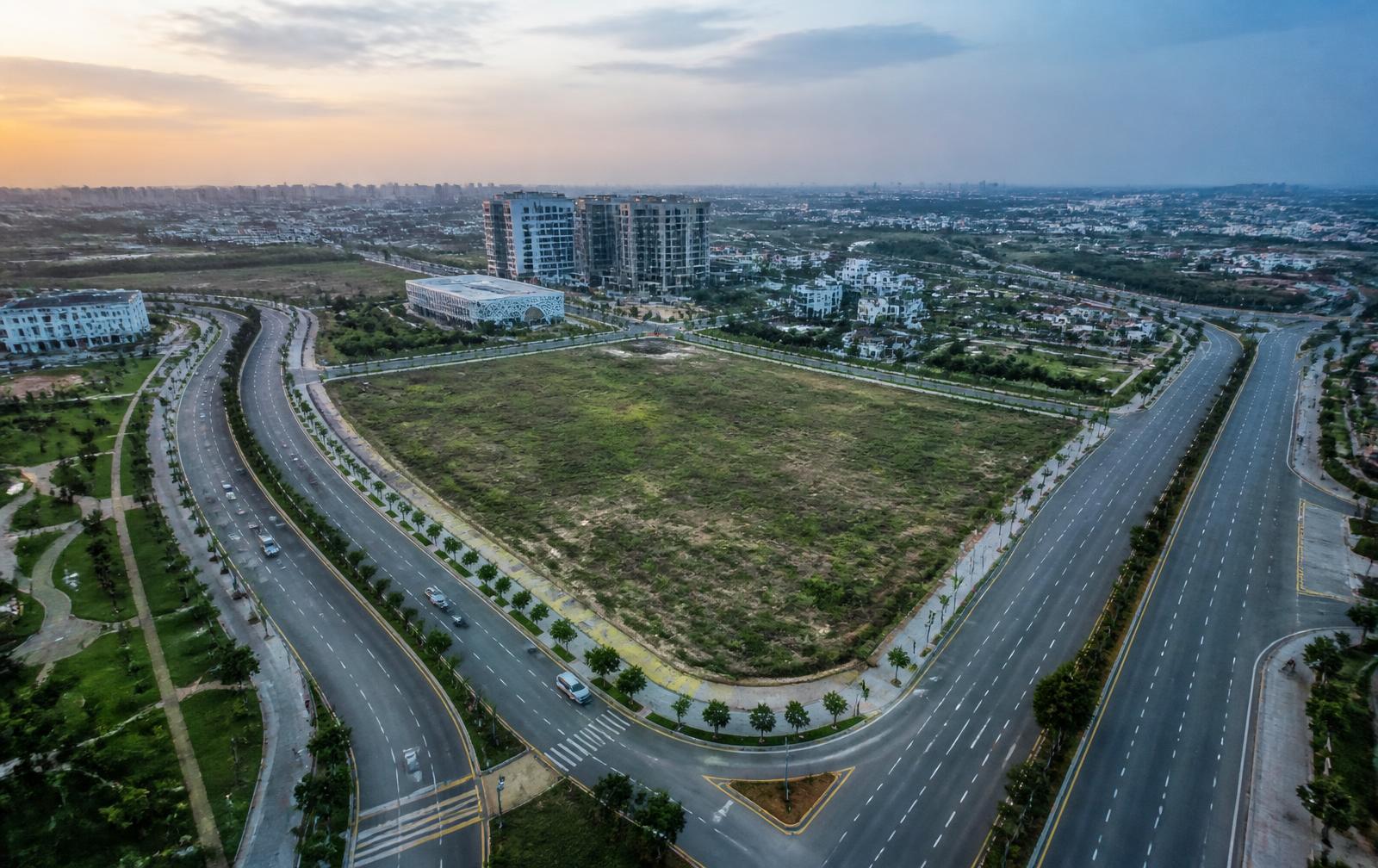 Aerial view of a development land parcel in a contemporary Pakistani urban growth corridor