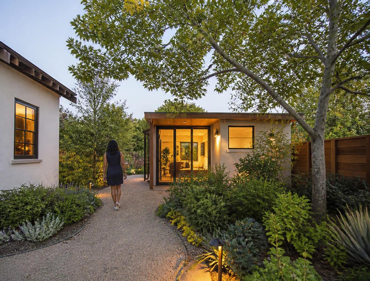 Contemporary accessory dwelling unit integrated into a landscaped California garden